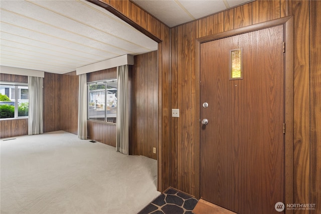 4915 Samish Unit 66, Bellingham, WA 98229 - entrance foyer featuring wooden walls and carpet floors