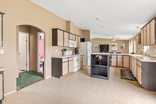 172 Equine Dr, Onalaska, WA 98570 - kitchen featuring white appliances, ceiling fan, light floors, arched walkways, and light countertops