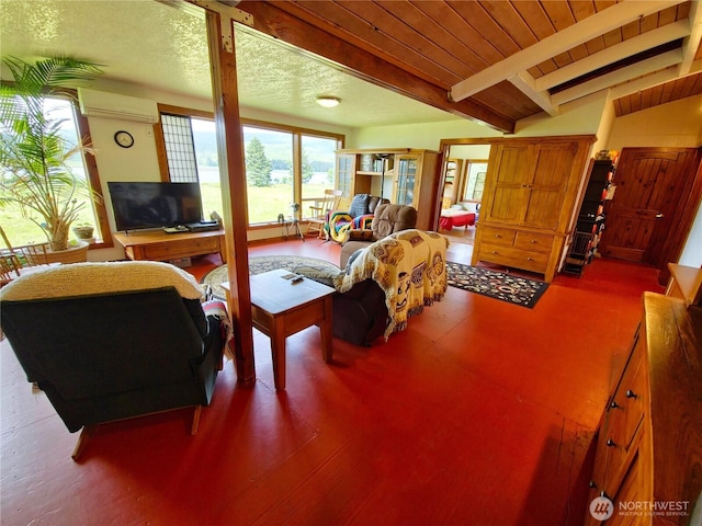 752 Parpala, Naselle, WA 98638 - living area featuring an AC wall unit and beamed ceiling