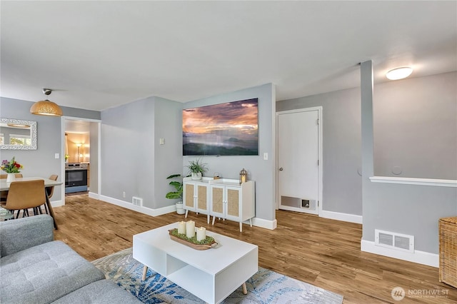21628 SE 271st St, Maple Valley, WA 98038 - living area with wood finished floors
