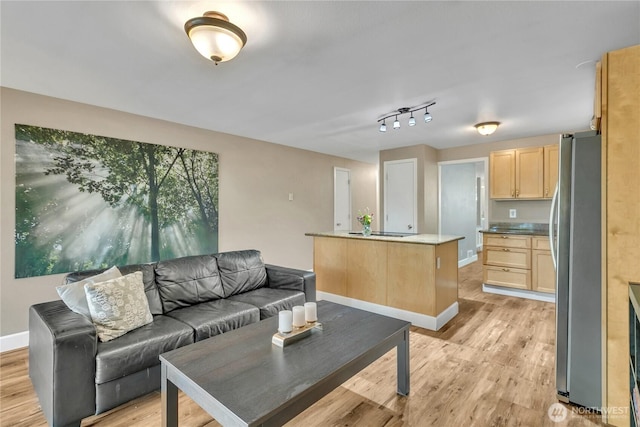 21628 SE 271st St, Maple Valley, WA 98038 - living room with light wood-style floors and baseboards