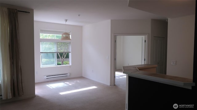 6121 Hazel Ave SE Unit A4, Auburn, WA 98092 - spare room with baseboard heating and carpet floors