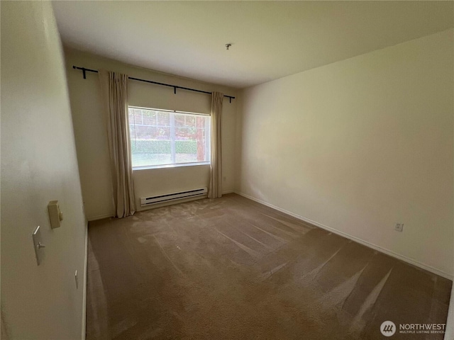 6121 Hazel Ave SE Unit A4, Auburn, WA 98092 - carpeted spare room with a baseboard heating unit and baseboards