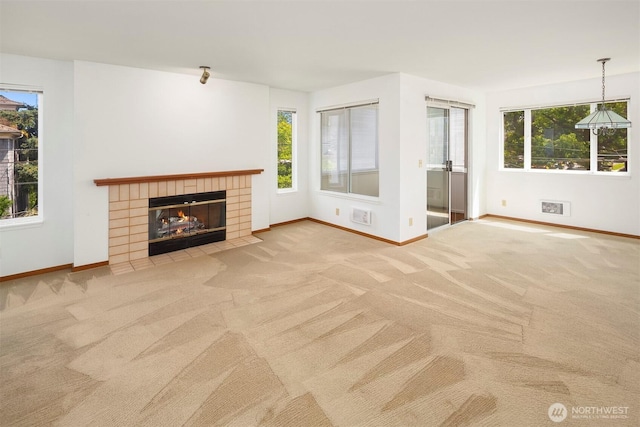 1312 S Massachusetts St Unit 202, Seattle, WA 98144 - unfurnished living room with carpet flooring and healthy amount of natural light