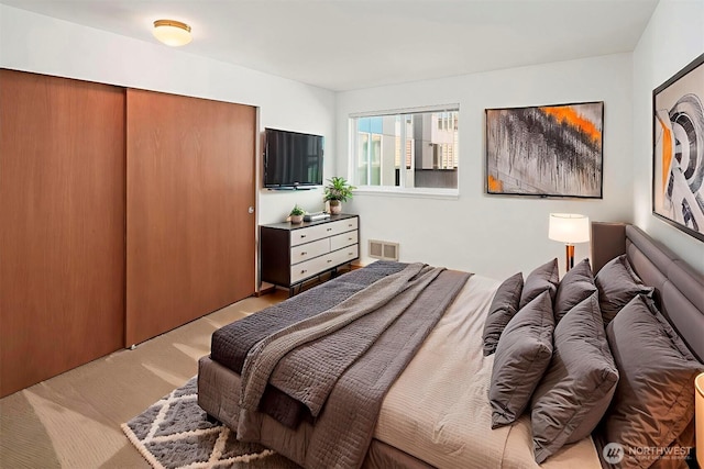 1312 S Massachusetts St Unit 202, Seattle, WA 98144 - bedroom featuring light carpet and a closet