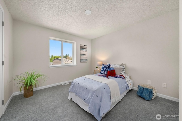5201 S 298th Ct, Auburn, WA 98001 - carpeted bedroom with a textured ceiling and baseboards