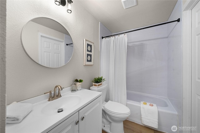 5201 S 298th Ct, Auburn, WA 98001 - full bath with vanity, shower / tub combo, and wood finished floors