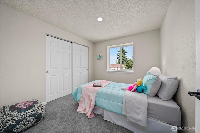 5201 S 298th Ct, Auburn, WA 98001 - bedroom with carpet, a textured ceiling, a closet, and recessed lighting