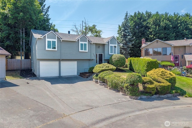 5201 S 298th Ct, Auburn, WA 98001 - raised ranch featuring concrete driveway and a garage