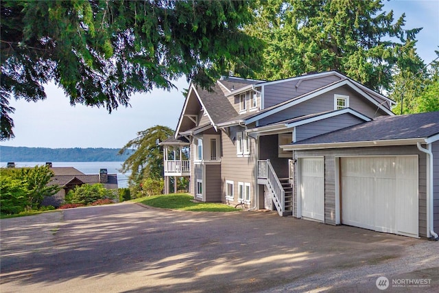 2855 SW 300th Pl, Federal Way, WA 98023 - view of front of property with asphalt driveway, an attached garage, and a shingled roof
