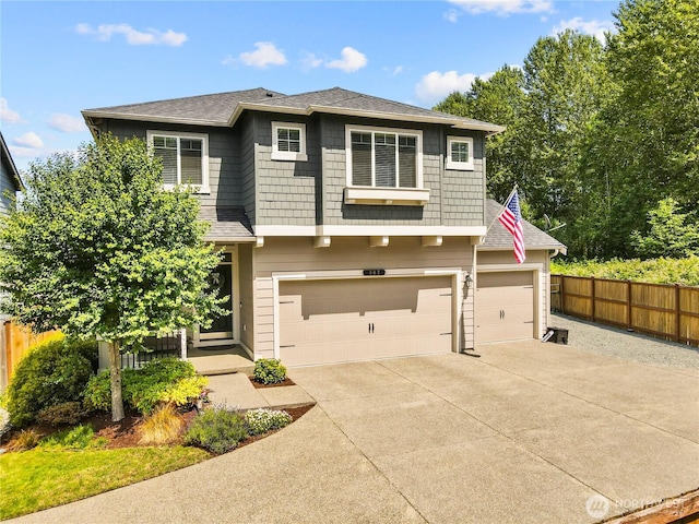 902 Van Ogle Ln NW, Orting, WA 98360 - view of front of property with concrete driveway, a garage, and a shingled roof