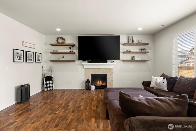 902 Van Ogle Ln NW, Orting, WA 98360 - living room with wood finished floors, a tiled fireplace, and recessed lighting
