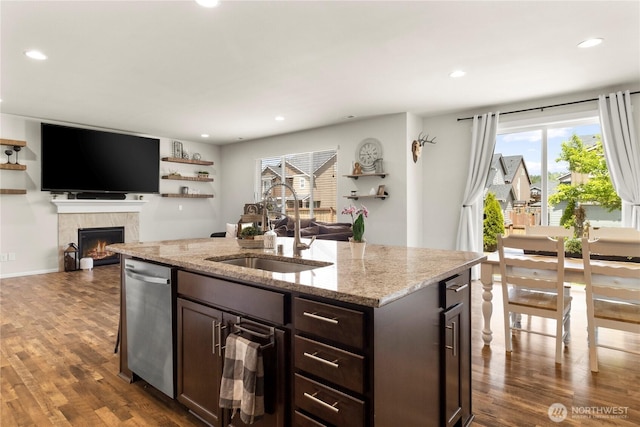 902 Van Ogle Ln NW, Orting, WA 98360 - kitchen with dishwasher, dark wood finished floors, dark brown cabinets, a center island with sink, and open floor plan