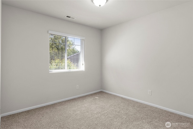 902 Van Ogle Ln NW, Orting, WA 98360 - spare room featuring carpet floors and baseboards