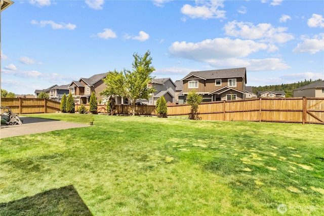902 Van Ogle Ln NW, Orting, WA 98360 - fenced backyard with a residential view and a patio area