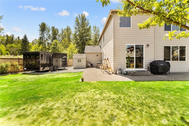 902 Van Ogle Ln NW, Orting, WA 98360 - rear view of house with a shed and a patio