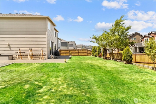 902 Van Ogle Ln NW, Orting, WA 98360 - fenced backyard featuring a patio area and a residential view