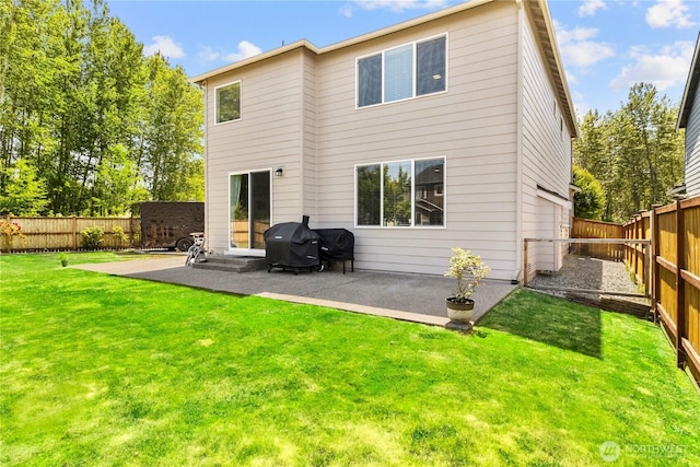902 Van Ogle Ln NW, Orting, WA 98360 - back of house featuring a patio area and a fenced backyard