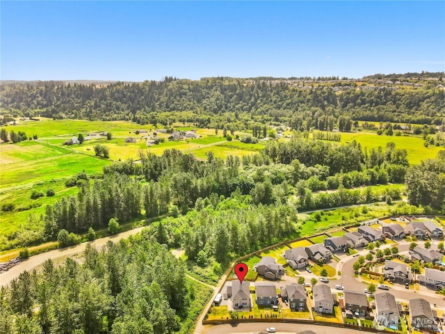 902 Van Ogle Ln NW, Orting, WA 98360 - aerial view of residential area with a tree filled landscape