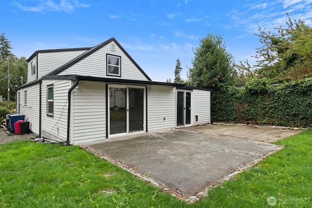 15421 10th Ave SW, Burien, WA 98166 - rear view of property with a patio area and a lawn