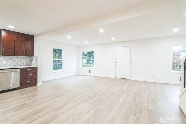 15421 10th Ave SW, Burien, WA 98166 - unfurnished living room with healthy amount of natural light, light wood-style floors, and recessed lighting