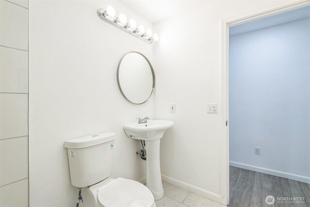 15421 10th Ave SW, Burien, WA 98166 - bathroom featuring toilet and wood finished floors