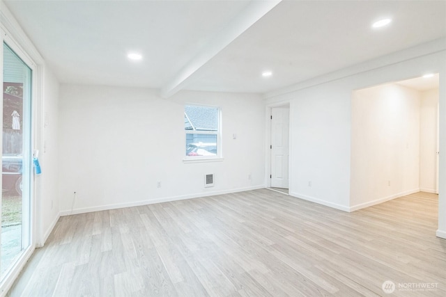 15421 10th Ave SW, Burien, WA 98166 - empty room featuring light wood-style floors, recessed lighting, and beam ceiling