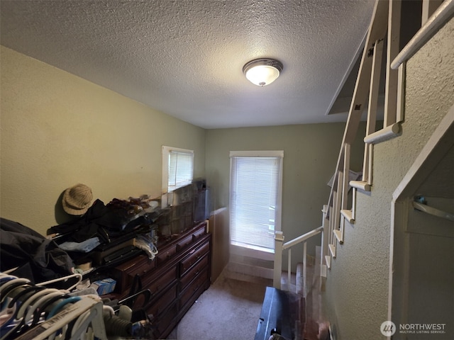 2719 Pacific Ave, Hoquiam, WA 98550 - carpeted bedroom with a textured ceiling and a textured wall