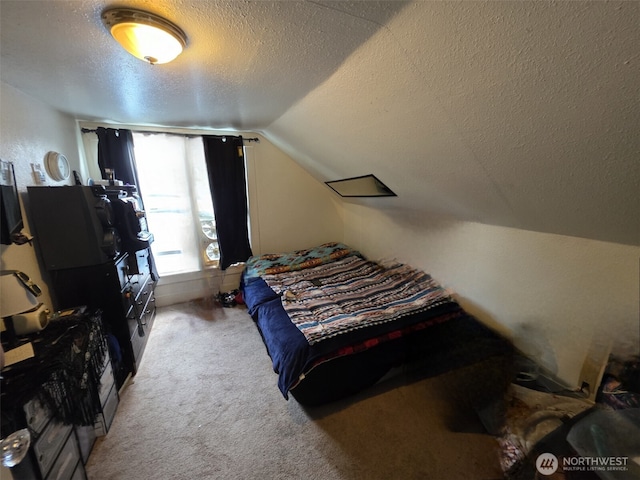 2719 Pacific Ave, Hoquiam, WA 98550 - bedroom featuring a textured ceiling, vaulted ceiling, and light carpet