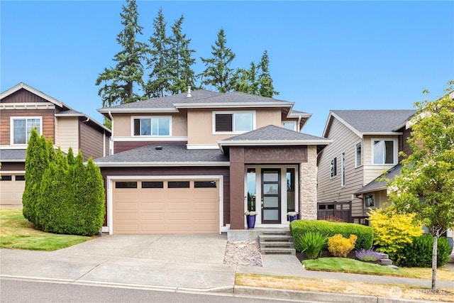 2511 124th Pl SE, Everett, WA 98208 - prairie-style home featuring stucco siding, a garage, concrete driveway, and a shingled roof