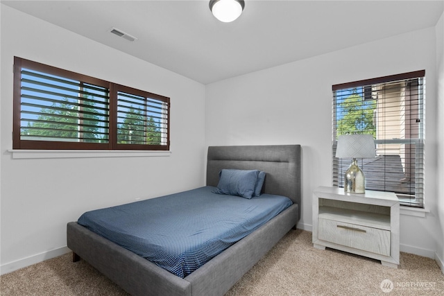 2511 124th Pl SE, Everett, WA 98208 - carpeted bedroom featuring multiple windows