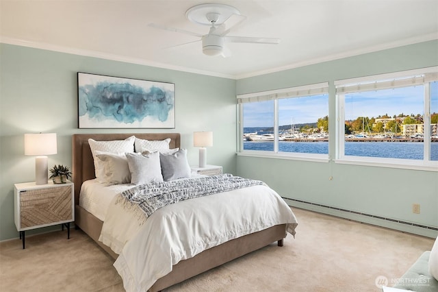 515 Lake St S Unit 205, Kirkland, WA 98033 - bedroom featuring a baseboard radiator, carpet, crown molding, a water view, and a ceiling fan