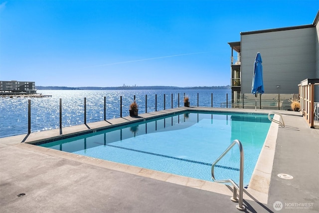 515 Lake St S Unit 205, Kirkland, WA 98033 - view of swimming pool featuring a water view and a boat dock