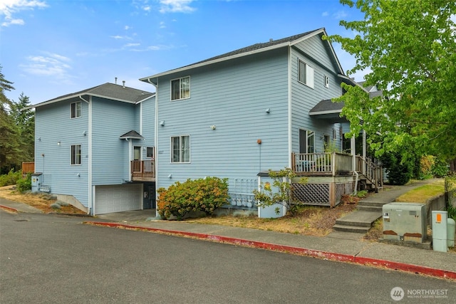 6317 Barstow Ln SE Unit 8, Lacey, WA 98513 - view of front of property featuring a garage and driveway