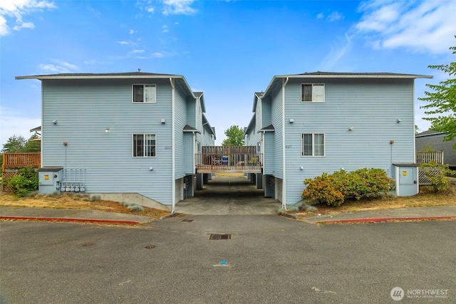 6317 Barstow Ln SE Unit 8, Lacey, WA 98513 - back of property featuring asphalt driveway