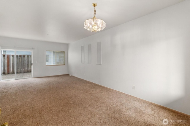 6317 Barstow Ln SE Unit 8, Lacey, WA 98513 - empty room featuring carpet and a chandelier