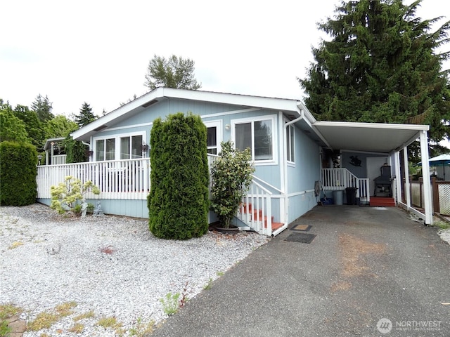 1200 Lincoln St Unit 154, Bellingham, WA 98229 - manufactured / mobile home featuring driveway and a carport