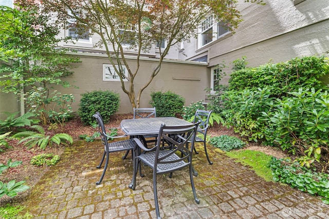 219 N Tacoma Ave Unit A205, Tacoma, WA 98403 - view of patio / terrace featuring outdoor dining space