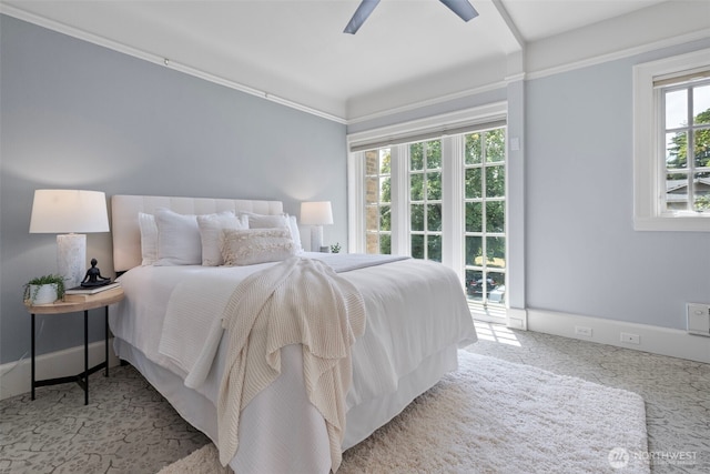 219 N Tacoma Ave Unit A205, Tacoma, WA 98403 - carpeted bedroom featuring multiple windows and a ceiling fan