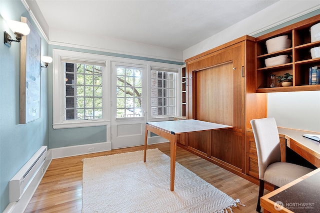 219 N Tacoma Ave Unit A205, Tacoma, WA 98403 - office area featuring baseboard heating and light wood-style floors