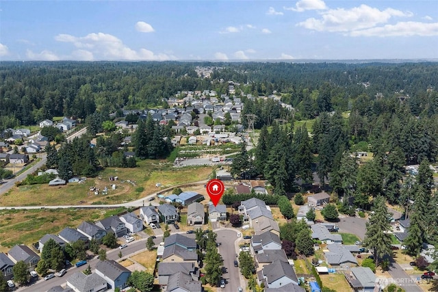 6725 159th St E, Puyallup, WA 98375 - aerial view of property's location with nearby suburban area and a heavily wooded area