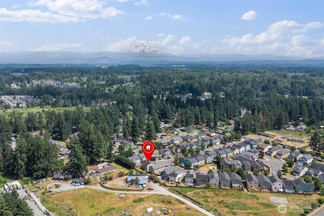 6725 159th St E, Puyallup, WA 98375 - aerial view of property's location featuring nearby suburban area and a mountainous background