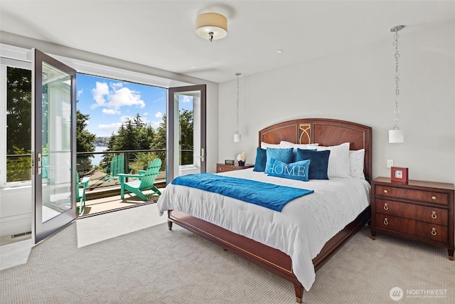 8246 W Mercer Way, Mercer Island, WA 98040 - bedroom featuring light carpet and access to outside