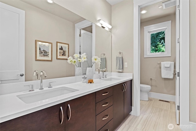 8246 W Mercer Way, Mercer Island, WA 98040 - bathroom with double vanity and recessed lighting