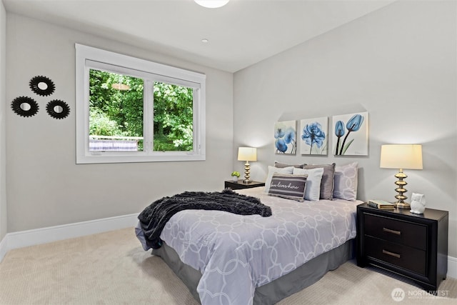 8246 W Mercer Way, Mercer Island, WA 98040 - bedroom with carpet flooring and baseboards