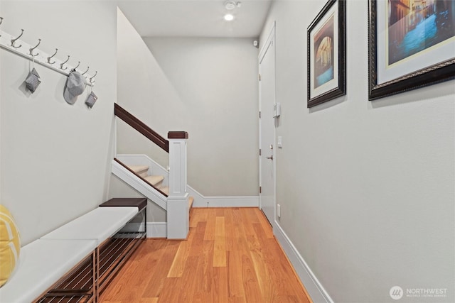 8246 W Mercer Way, Mercer Island, WA 98040 - corridor featuring light wood-style flooring, stairs, and recessed lighting
