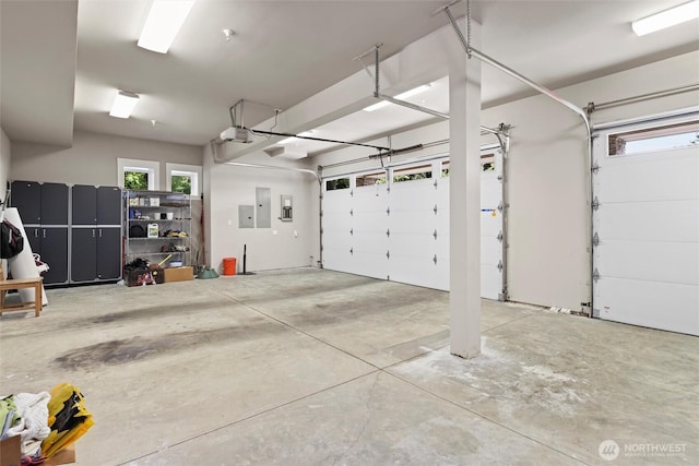 8246 W Mercer Way, Mercer Island, WA 98040 - garage featuring electric panel and a garage door opener