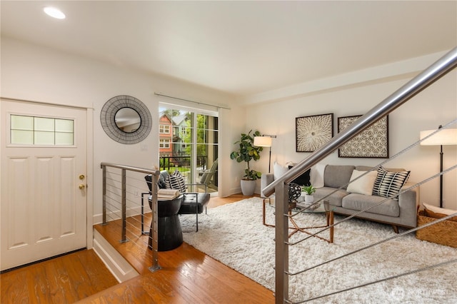 2674 SW Sylvan Heights Dr, Seattle, WA 98106 - living area featuring wood finished floors and baseboards