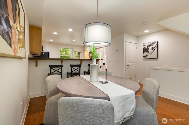 2674 SW Sylvan Heights Dr, Seattle, WA 98106 - dining area featuring wood finished floors and recessed lighting