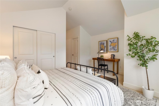 2674 SW Sylvan Heights Dr, Seattle, WA 98106 - carpeted bedroom featuring lofted ceiling and a closet
